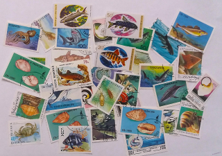Balíček známek - ryby, mořská fauna - 30 ks